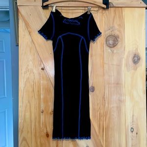 Urban Outfitter small ruffle dress with blue stitching.